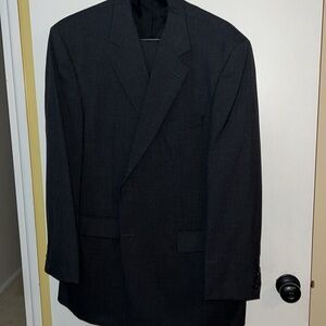Men’s gray suit jacket and slacks